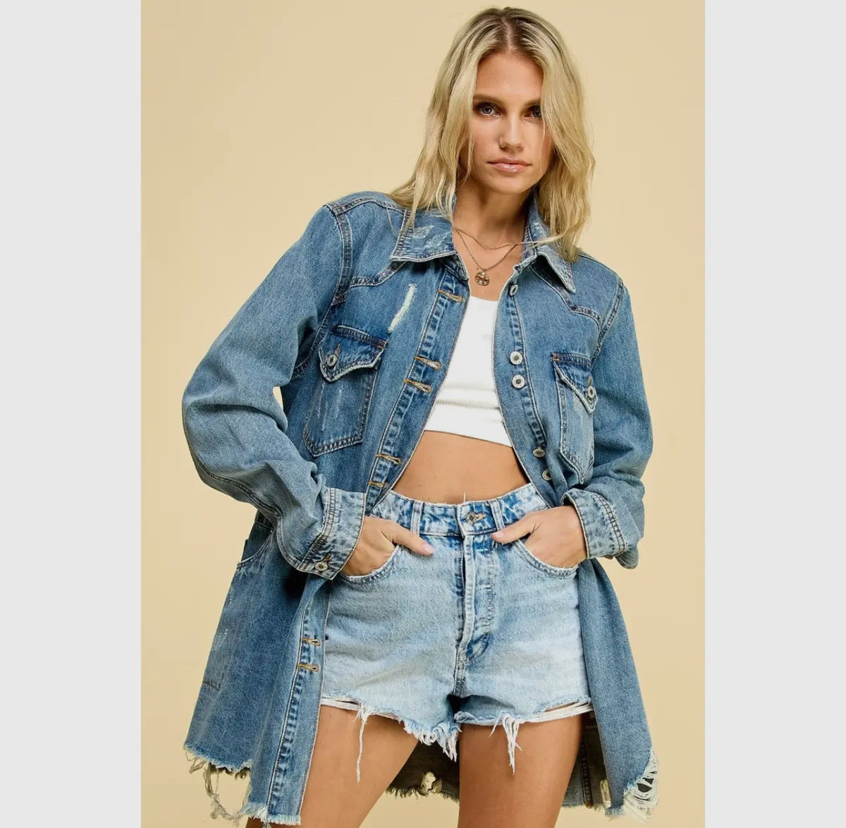 The Long Line Distressed Denim Jacket